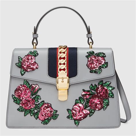 gucci white sylvie embroidered top bag|gucci sylvie top handle bag.